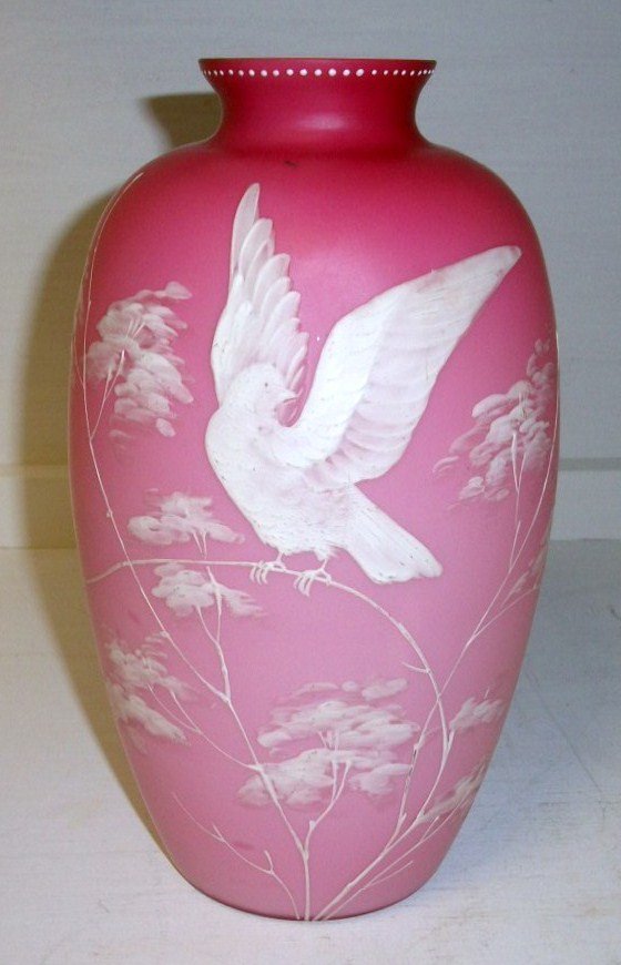 Thomas Webb Enamelled Vase: 9 1/2" tall enamelled peachblow vase. Heavy white enamelled white dove of peace and floral motif. Unsigned attributed to Thomas Webb