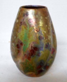 Clement Massier Vase: 4" Clement Massier vase iridescent glaze of berries and leaves. Signed Golfe Juan on base