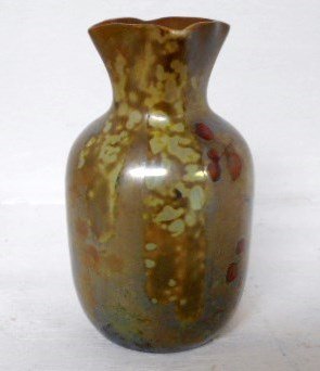 Clement Massier Cabinet Vase: 3 3/4" tall Iridescent cabinet vase by Clement Massier. Squared top structure enhances an iridescent leaf and berry glaze. Signed Golfe Juan (A.M.) on base