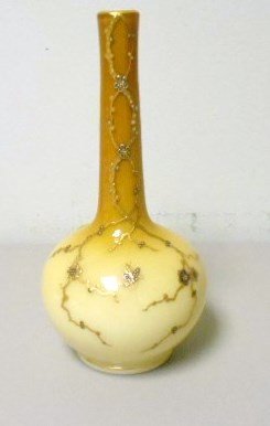 Thomas Webb Dragonfly Vase: 7 1/2" unsigned Thomas Webb vase. Caramel to cream glass adorned with a beautiful gold enameling of flowers and a dragonfly. Twisted and polished pontil.