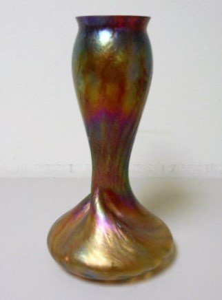 Rindskopt Iridescent Vase: 10 1/4" Rindskopt iridescent vase with twisted neck. Stunning deep purples and reds to iridescent green colors.