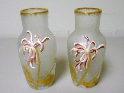 Pair of Mont Joye Vases: 6" tall pair of Mont Joye enameled vases. Heavily enameled flowers on frosted chipped ice cameoed glass. Unsigned attributed to Mont Joye.