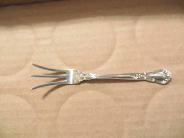 Sterling, Gorham Lemon Fork: Excellent condition. Chantilly pattern at4 & 1/2" & .45 oz.