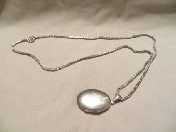Sterling Silver Locket & Chain: .925. 22 Grams. 24" chain