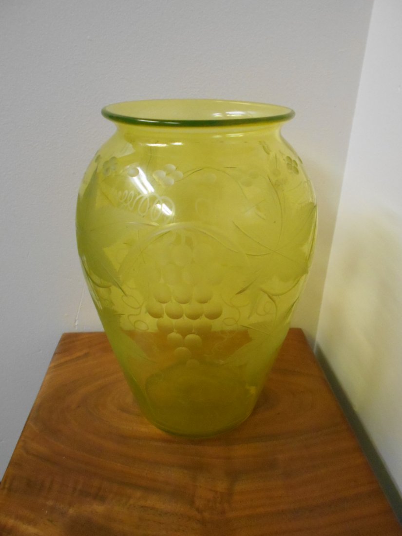 Pairpoint Vaseline Vase: 9" Pairpoint Vaseline intaglio cut vase. Grapes and vines motif. Polished pontil.