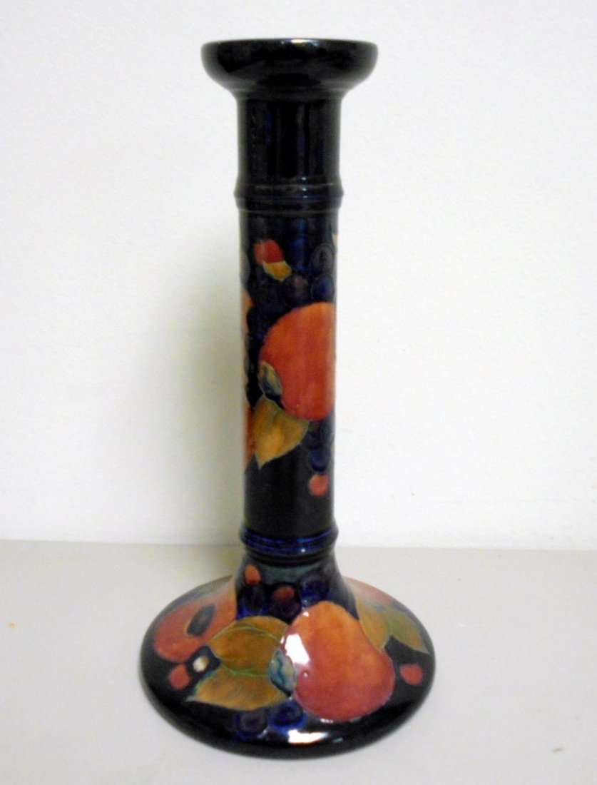 Large Moorcroft Lamp Base: 12 1/4" tall Moorcroft lamp base. Blue glaze with fruit motif, signed incised made in England Moorcroft and Blue M.