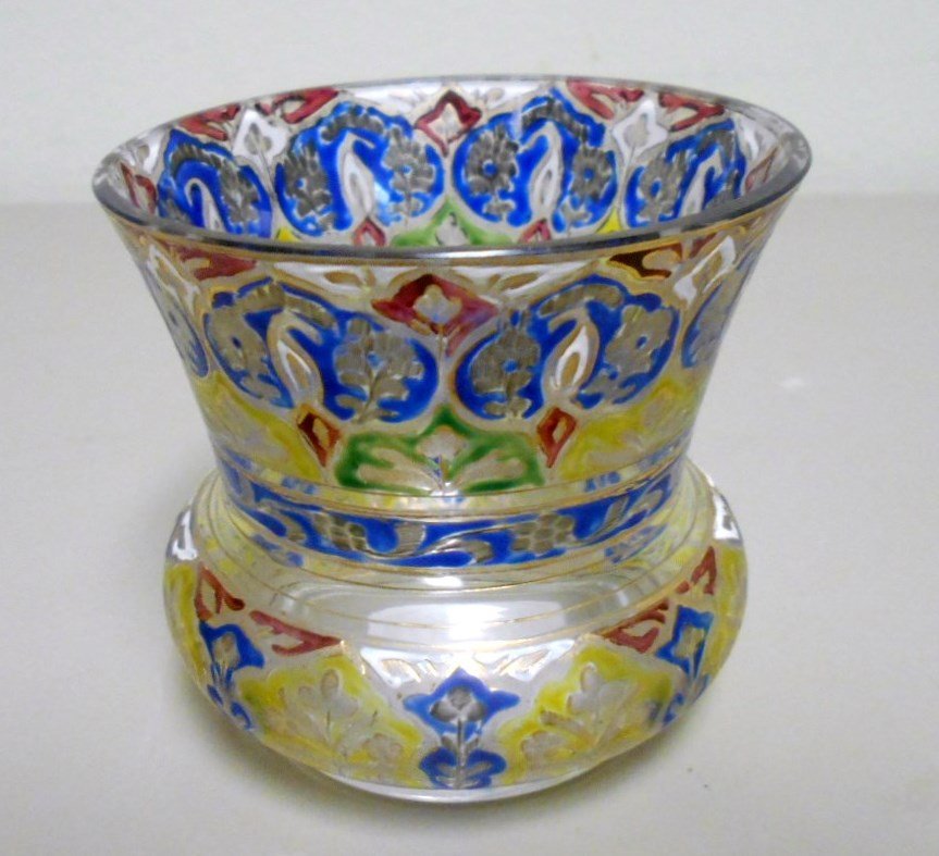 Moser Enameled Vase: 2 3/4" tall intaglio cut enameled vase. Cut floral decor accentuated by red, white, and blue enameling. Unsigned attributed to Moser.