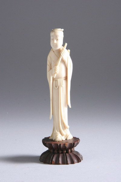 CHINESE IVORY FIGURE OF A FEMALE MUSICIAN, early R: CHINESE IVORY FIGURE OF A FEMALE MUSICIAN, early Republic period. Wearing long robes, a high chignon, holding a flute - 5 in. high.