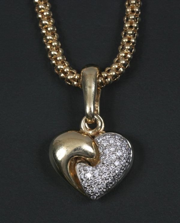 CHIMENTO YELLOW GOLD AND DIAMOND HEART PENDANT NE: CHIMENTO YELLOW GOLD AND DIAMOND HEART PENDANT NECKLACE. 18K tubular weave yellow gold chain suspends heart shaped pendant with pave-set with numerous round diamonds weighing approximately .75 ct. Cha