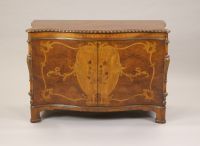 A GEORGE III STYLE MARQUETRY INLAID CABINET, earl: A GEORGE III STYLE MARQUETRY INLAID CABINET, early 20th century. The serpentine shaped burled top with gadrooned edge above similar marquetry frieze, conforming center doors open to shelving; curved b
