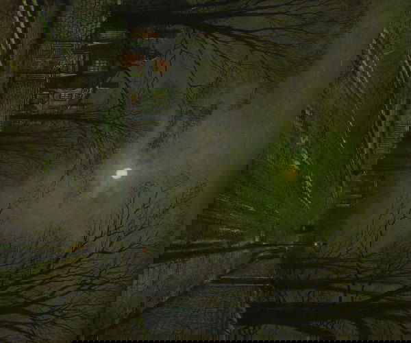 ATTRIBUTED TO JOHN ATKINSON GRIMSHAW (British, 18: ATTRIBUTED TO JOHN ATKINSON GRIMSHAW (British, 1836-1893). OCTOBER'S FULL MOON ON VILLAGE STREET, signed lower right. Oil on canvas - 30 in. x 25 in.