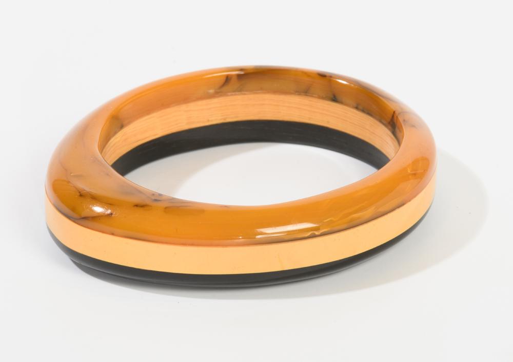 UNUSUAL ASYMETRICAL TRI-COLOR STRIPED HARD PLASTIC OR (1 of 1)