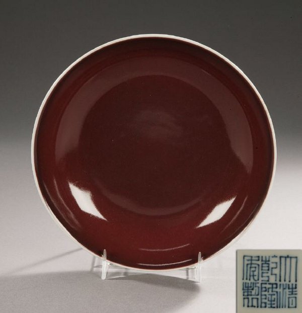 A CHINESE COPPER RED PORCELAIN SAUCER DI