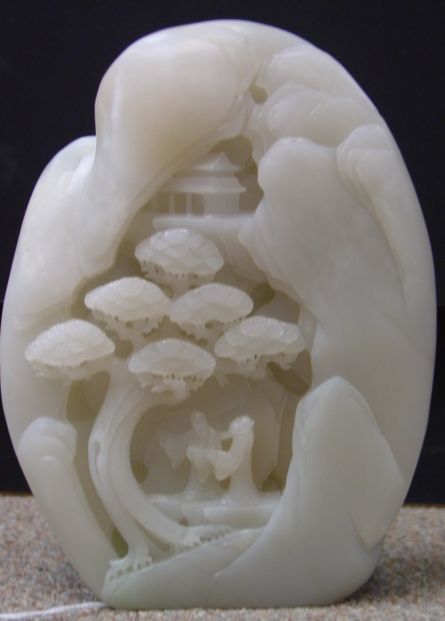 A CHINESE WHITE CARVED JADE BOULDER, lat - 2