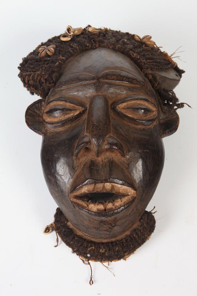 CAMEROONIAN CARVED WOOD MASK (KAM OR AKAM), Late 20th century, Grasslands region (probably Kom) (1 of 1)