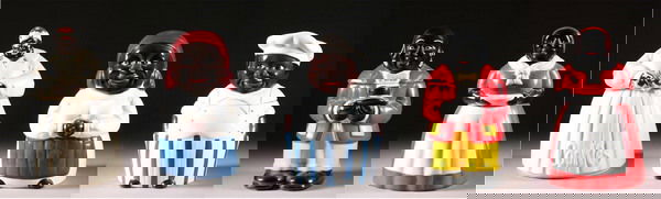 FIVE BLACK AMERICANA COOKIE JARS. - 11 in. high, Mc: FIVE BLACK AMERICANA COOKIE JARS. Including Mammy" by McCoy (incised "McCoy" on base), two unmarked "Mammy" cookie jars, one chef, and one butler - 11 in. high, McCoy Mammy."