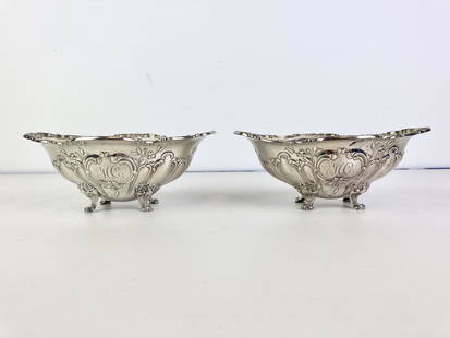 PAIR GORHAM CO. EARLY 20TH CENTURY STERLING SILVER SHAPED BOAT-FORM BON-BON DISHES. Relief leaf and: PAIR GORHAM CO. EARLY 20TH CENTURY STERLING SILVER SHAPED BOAT-FORM BON-BON DISHES. Relief leaf and berry decoration; conjoined monogram "HC" in cartouche; four scroll feet.H: 2 1/2 in.; L: 6 5/8