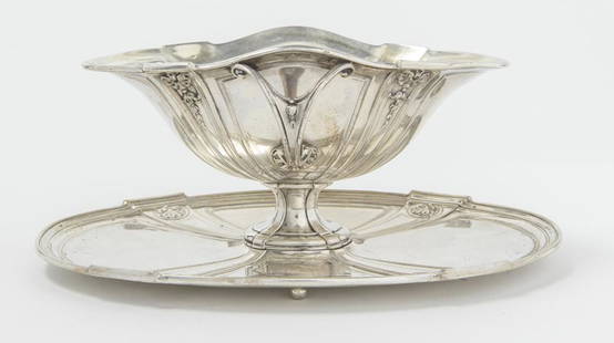 GERMAN SILVER (800-FINE) SAUCEBOAT WITH DETACHABLE UNDERTRAY. Shaped, two=handle boat with relief: GERMAN SILVER (800-FINE) SAUCEBOAT WITH DETACHABLE UNDERTRAY. Shaped, two=handle boat with relief shell motif - L: 9 1/4 in. Wt. 18.8 troy oz.