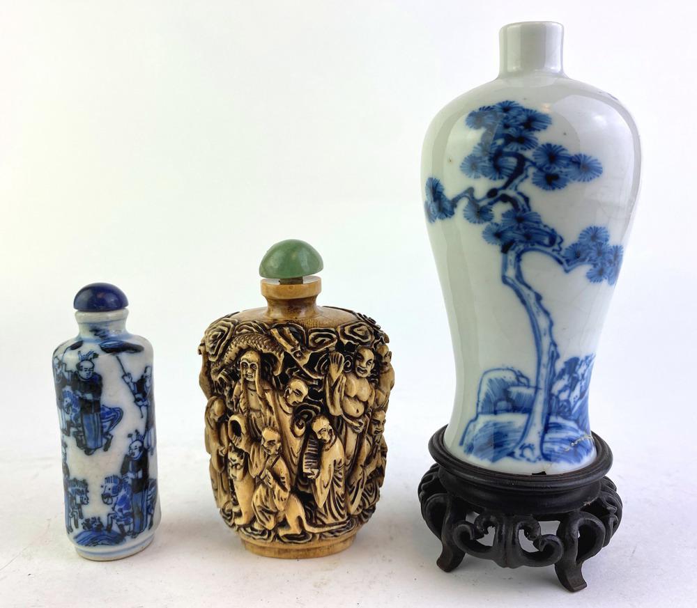 TWO CHINESE SNUFF BOTTLES, AND A MINIATURE BLUE AND WHITE VASE SIGNED WITH FOUR-CHARACTER MARK,: TWO CHINESE SNUFF BOTTLES, AND A MINIATURE BLUE AND WHITE VASE SIGNED WITH FOUR-CHARACTER MARK. One bone snuff bottle carved with numerous figures; other, blue and white cylindrical with standing figu