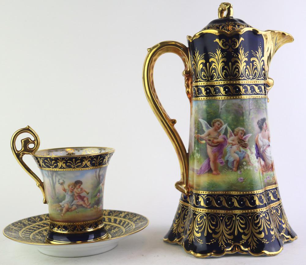 ELEVEN-PIECE LATE 19TH CENTURY DRESDEN POLYCHROMED PORCELAIN CHOCOLATE SET.     Including pot with (1 of 7)
