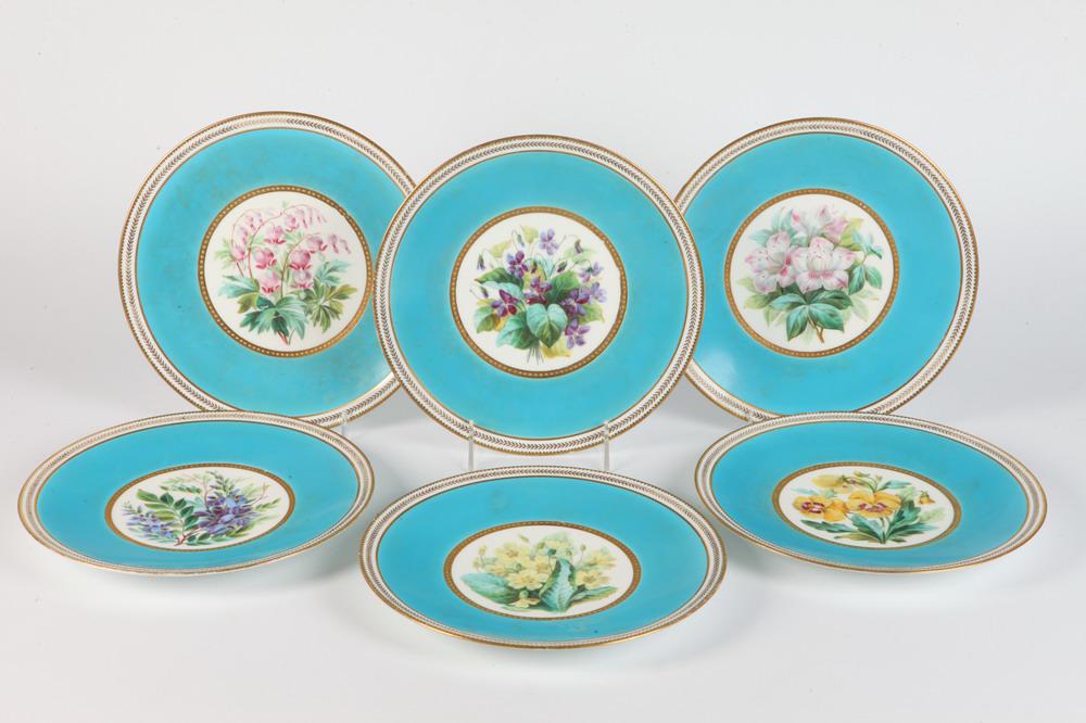 SET TEN HAND-PAINTED FLORAL DECORATED DESSERT PLATES WITH WIDE TURQUOISE AND GILT BORDERS.: SET TEN HAND-PAINTED FLORAL DECORATED DESSERT PLATES WITH WIDE TURQUOISE AND GILT BORDERS.