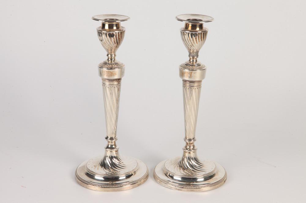 PAIR ENGLISH-WEIGHTED SILVER SWIRL-MOLDED CANDLESTICKS.   made in Sheffield.  Trumpet-shape support; (1 of 5)