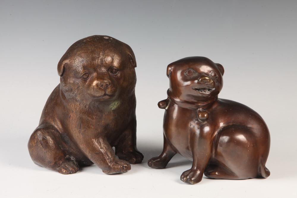 TWO JAPANESE BRONZE FIGURES OF DOGS .     Larger, textured, H: 6 3/4 in.; smaller, smooth-polished, (1 of 1)