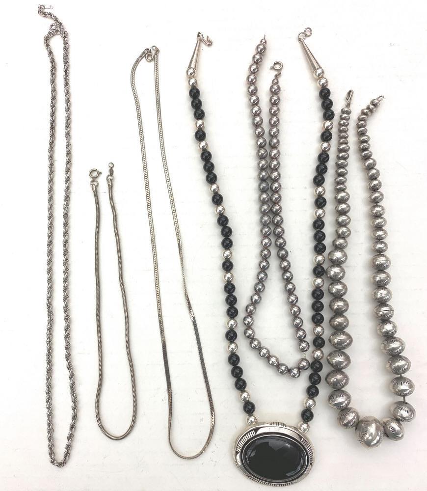 SIX ASSORTED SILVER FLEXIBLE-LINK AND BEAD NECKLACES. (1 of 1)