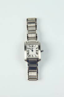 LADY'S CARTIER TANK FRANCAISE STEEL WRISTWATCH. #2303.: LADY'S CARTIER TANK FRANCAISE STEEL WRISTWATCH. #2303. Silver white enamel dial with black enamel Roman numerals and sapphire winding stem; brushed chunky link strap.