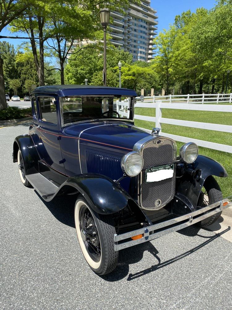 1930 FORD MODEL A DELUXE TWO-DOOR COUPE VINTAGE CAR,: 1930 FORD MODEL A DELUXE TWO-DOOR COUPE VINTAGE CAR. Hard top; navy blue body with red trim; rumble seat. Restored by Harry T. Fourhman, Glen Rock, PA, in May 1976. With maintenance records from 2020