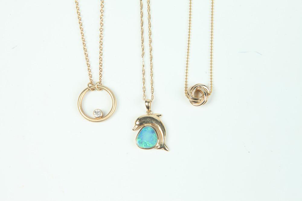 THREE ASSORTED 14K YELLOW GOLD PENDANTS ON 14K YELLOW GOLD CHAINS, - Dolphin pendant chain, L: 18"; (1 of 1)