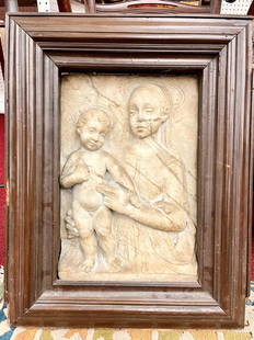IN THE MANNER OF GREGORIO DI LORENZO (Italian, circa 1436 - 1504). Madonna and Child, 18th century: IN THE MANNER OF GREGORIO DI LORENZO (Italian, circa 1436 - 1504). Madonna and Child, 18th century or later chiseled marble high relief after the work of early Italian artists such as Gregorio Di Lore