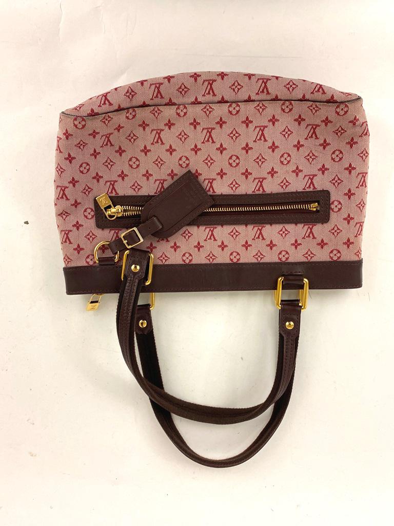 LOUIS VUITTON HANDBAG. (1 of 5)