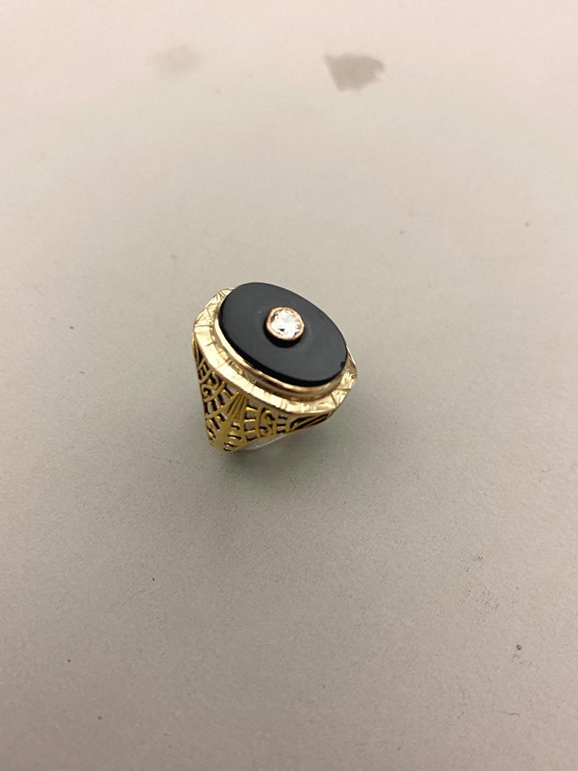14K YELLOW GOLD, BLACK ONYX AND DIAMOND RING, early 20th century. (1 of 5)