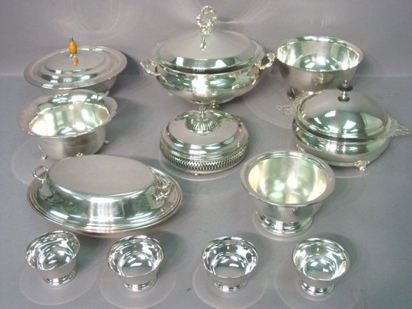 A Group of American Silver-Plated Table: A Group of American Silver-Plated Table Articles, Including: two covered footed tureens with Pyrex bowls, a covered condiment, four Cheshire salts, a covered vegetable dish, an Arts and Crafts style t