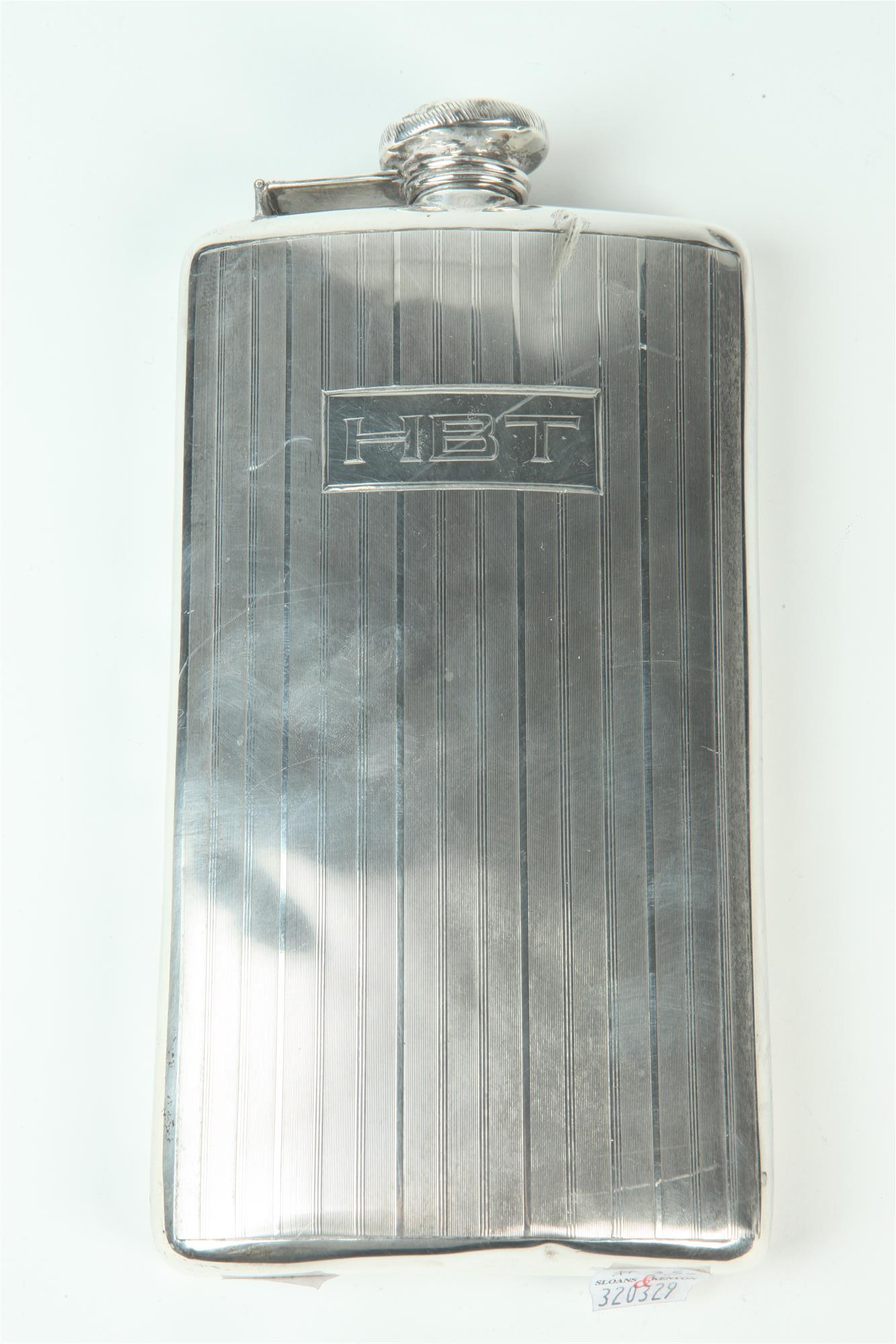 STERLING SILVER ONE-PINT HIP FLASK, early 20th century. - H: 8 1/4 in.; wt. 8.4 troy oz. (1 of 1)