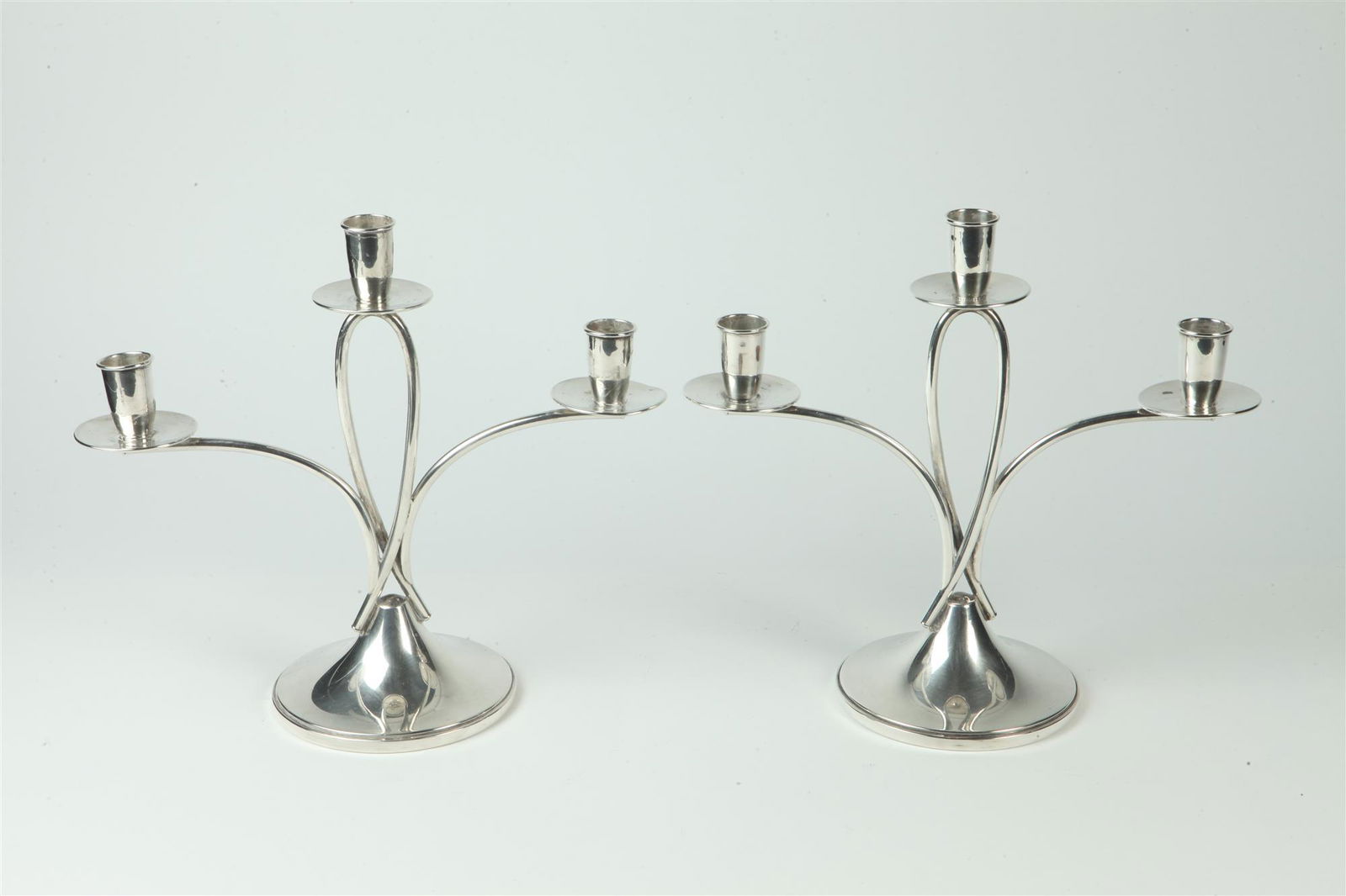 PAIR REED & BARTON CO. MID-CENTURY MODERN STERLING SILVER THREE-LIGHT CANDELABRA. (1 of 1)