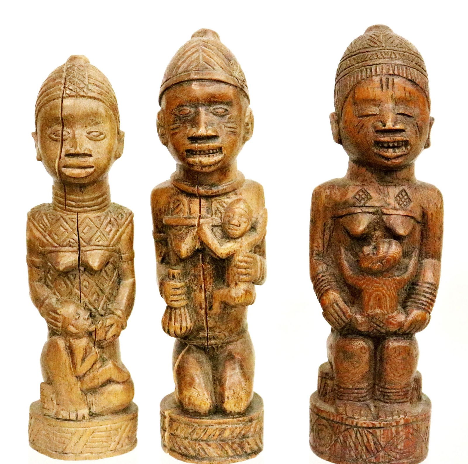 THREE AFRICAN HAND CARVED WOODEN FEMALE STATUES , Mid 20th century. - Height: 7 inches. (1 of 4)