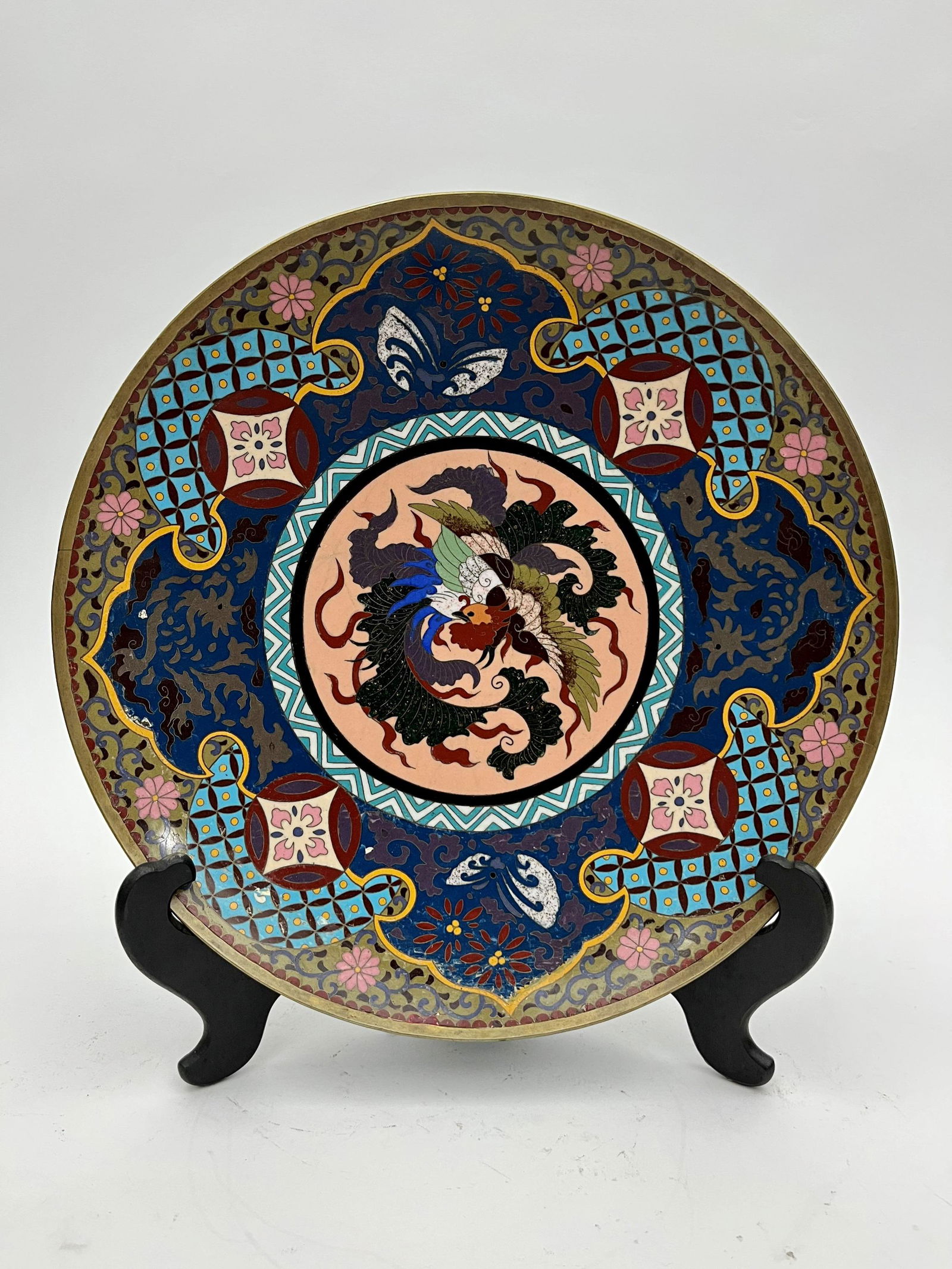 ANTIQUE JAPANESE CLOISONNE CHARGER, Meiji period, 1860-1912.: ANTIQUE JAPANESE CLOISONNE CHARGER, Meiji period, 1860-1912. Multi-color decoration of Phoenix bird in flight. D: 13 7/8 in.