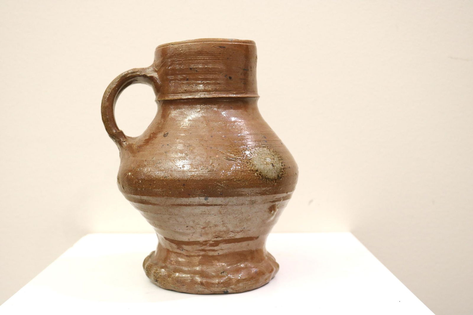 EARLY GERMAN BROWN-GLAZED STONEWARE PRIMITIVE MUG. circa 1550, Petal-molded base. (1 of 9)