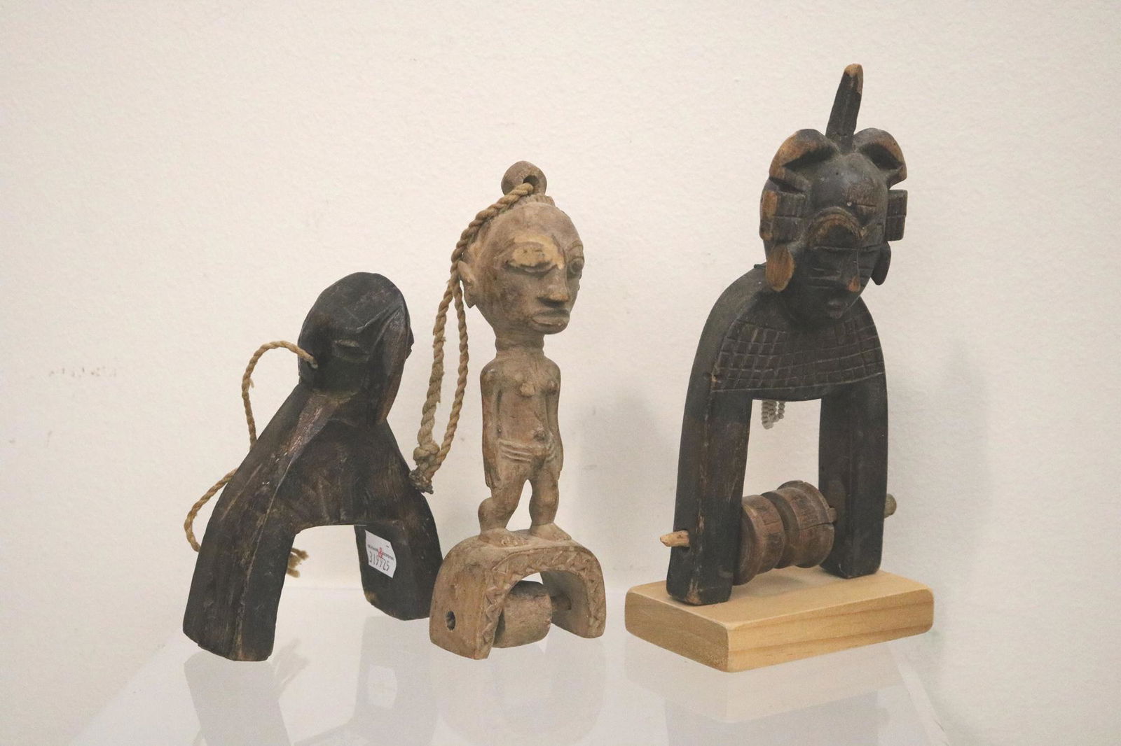 THREE SENUFO IVORY COAST HEDDLEY PULLEYS, Early-to-mid 20th century. (1 of 19)