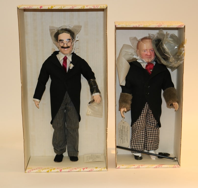 FIVE EFFANBEE "LEGENDS' SERIES HARD PLASTIC DOLLS INCLUDING TWO JOHN WAYNE AND MAE WEST, GROUCHO: FIVE EFFANBEE "LEGENDS' SERIES HARD PLASTIC DOLLS INCLUDING TWO JOHN WAYNE AND MAE WEST, GROUCHO MARX AND W.C. FIELDS, 1981. All in original boxes. - H: 17 in.