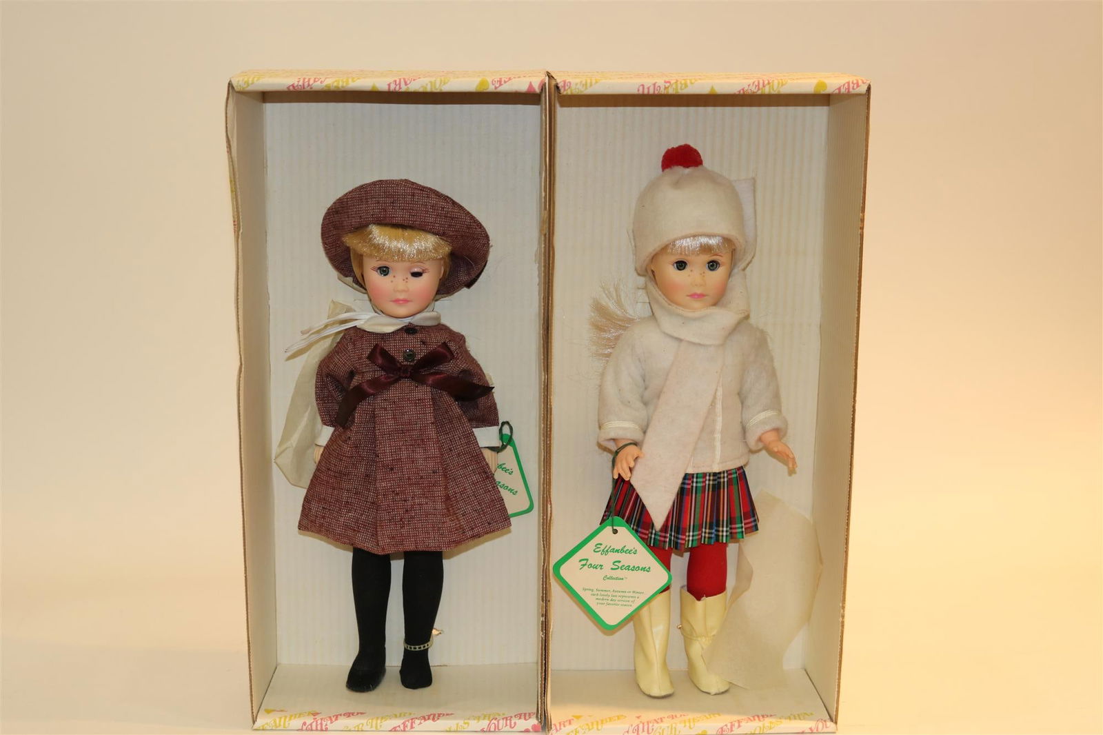 TWO EFFANBEE HARD PLASTIC DOLLS FROM THE "FOUR SEASONS" SERIES: AUTUMN AND WINTER, #3533 and#3534.: TWO EFFANBEE HARD PLASTIC DOLLS FROM THE "FOUR SEASONS" SERIES: AUTUMN AND WINTER, #3533 and#3534. In original boxes