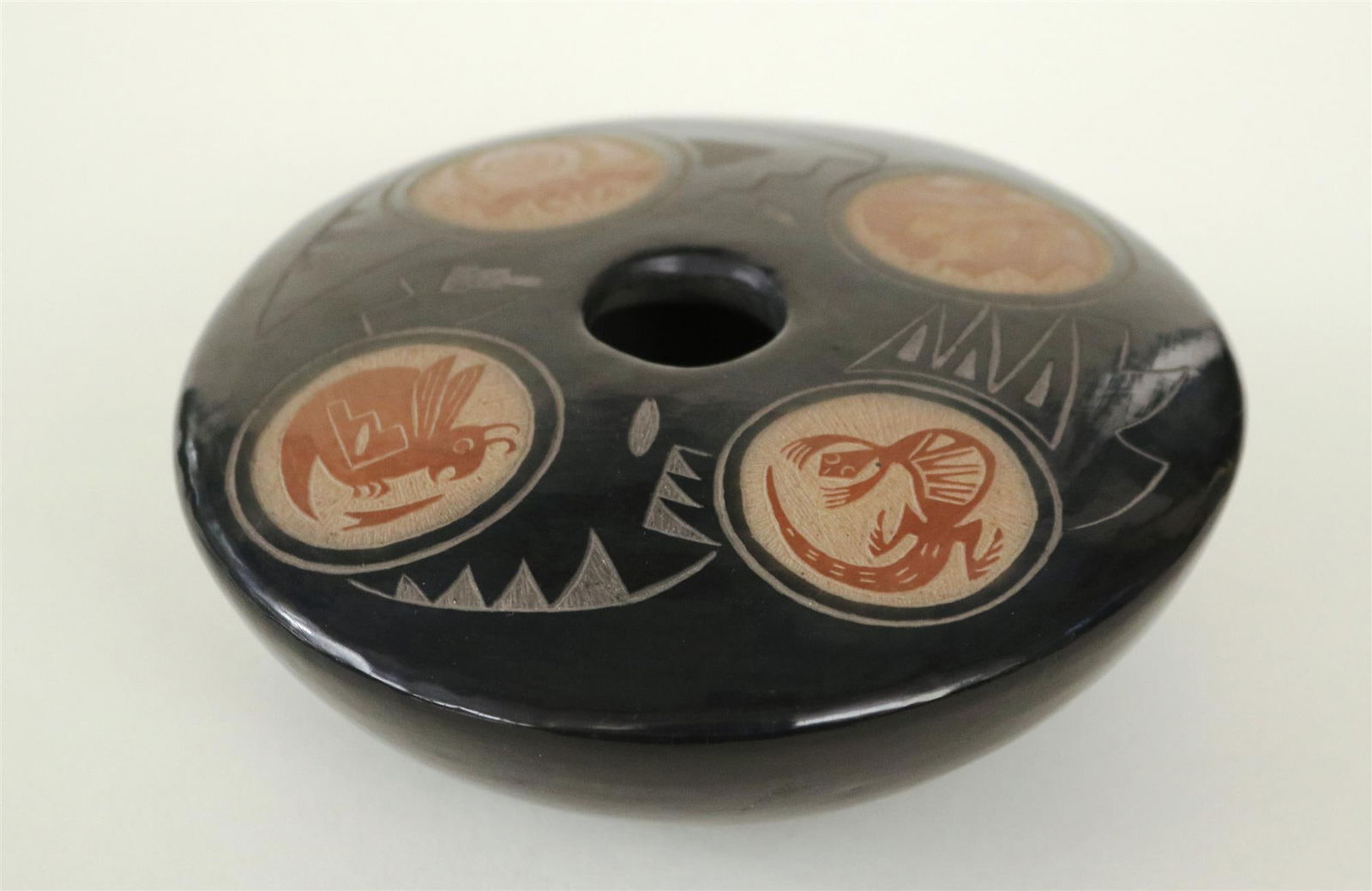 MAE TAPIA (American, 1956 - 2016). Black and Sienna Bowl, Sienna spots on a black seed pot with (1 of 7)