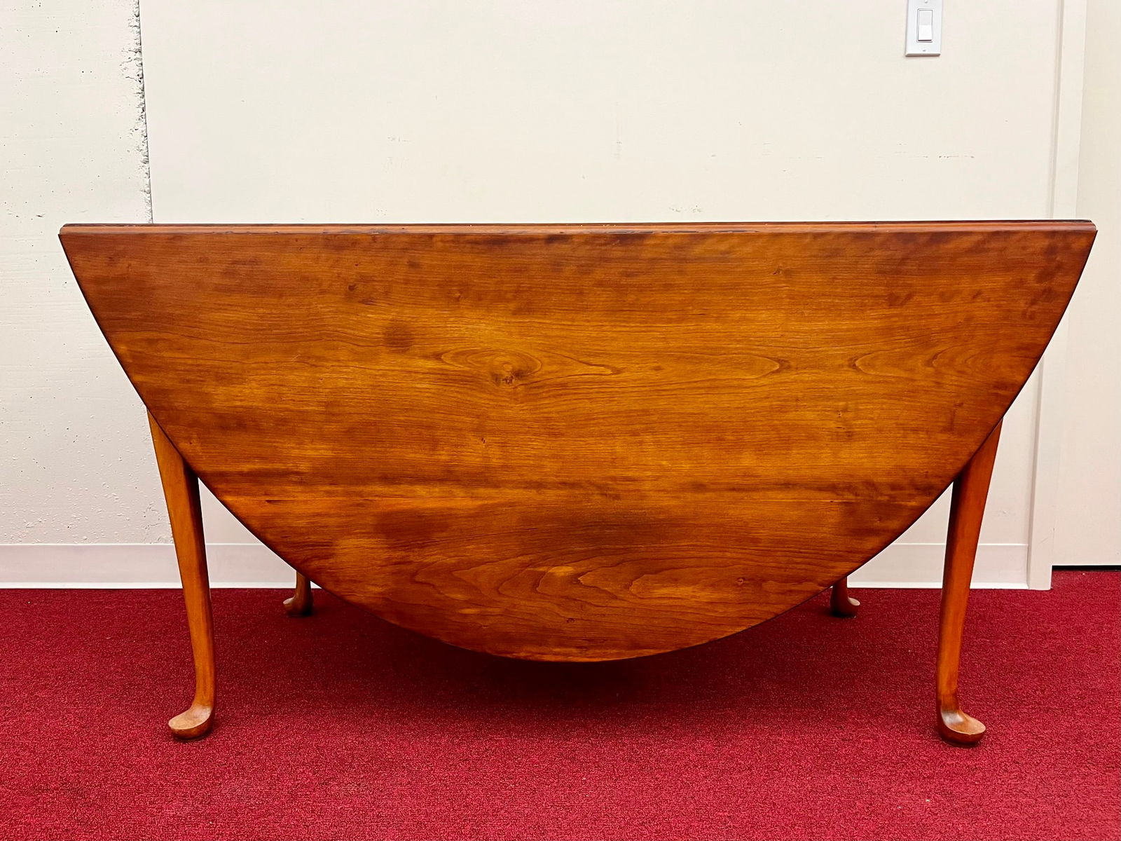 ELDRED WHEELER CHERRY WOOD GATE LEG DINING TABLE. - L: 71"; W: 58"; H: 29.5". (1 of 17)
