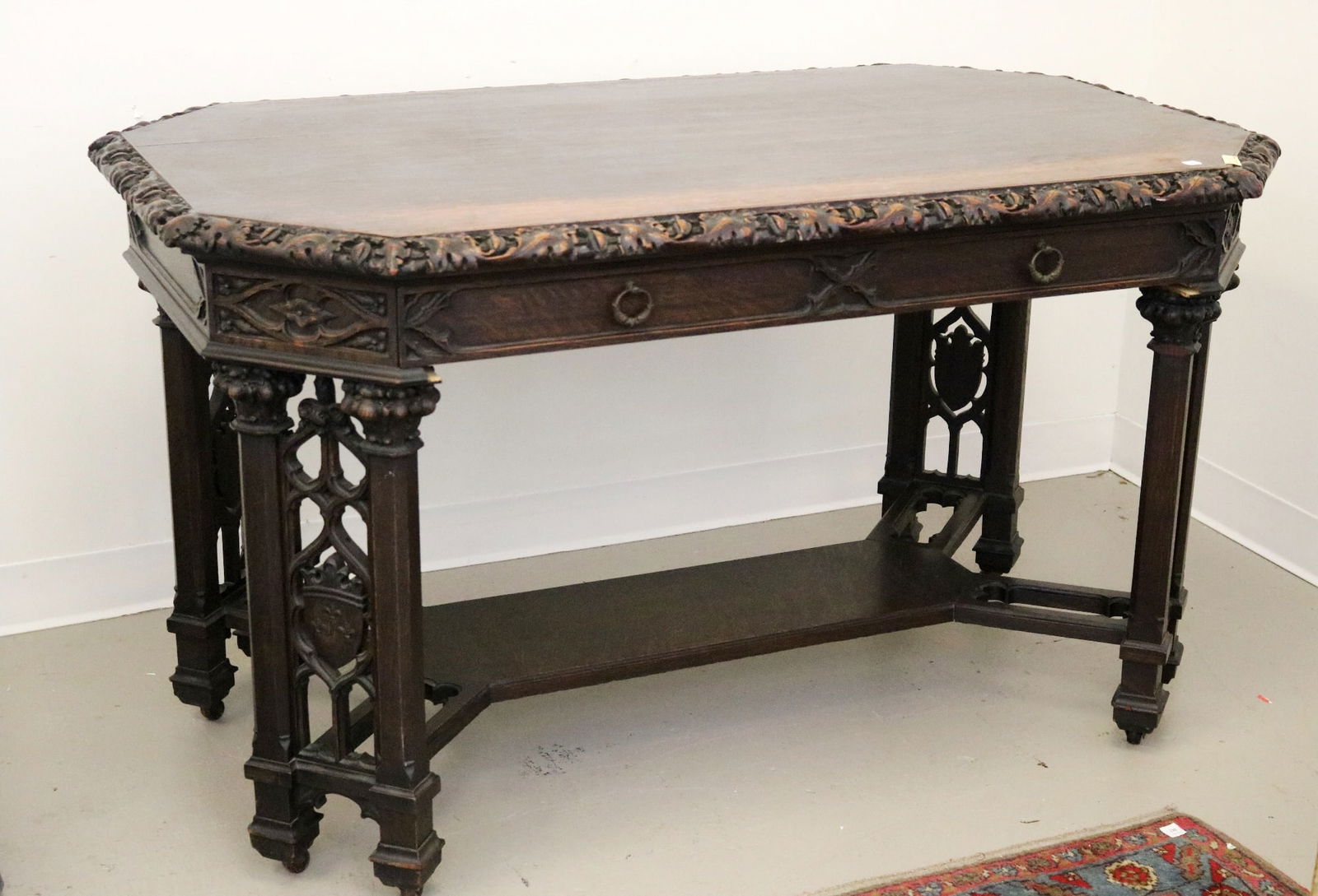 GOTHIC REVIVAL CARVED OAK LIBRARY TABLE, 19th century. (1 of 20)