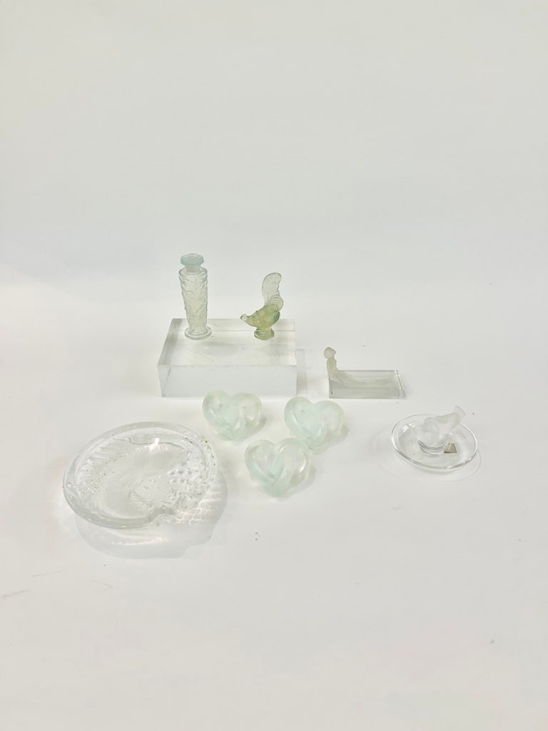TEN SMALL PIECES CRYSTAL LALIQUE AND SABINO CRYSTAL, - Dish, D: 6 1/8 in.: TEN SMALL PIECES CRYSTAL LALIQUE AND SABINO CRYSTAL. Including Lalique fish motif dish, Lalique lovebird, Lalique lovebird ring tray, Lalique pin dish with nude maiden, three Lalique hand coolers, Sab