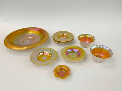 NINE PIECES STEUBEN AURENE CALCITE ART GLASS, early 20th century.: NINE PIECES STEUBEN AURENE CALCITE ART GLASS, early 20th century. Including shallow dish, D; 12 5/8 in.; five small dishes, 6 1/8 - 6 1/4 in.; pair bowls, D: 5 3/4 in.; one open salt, D: 3 1/2 in.
