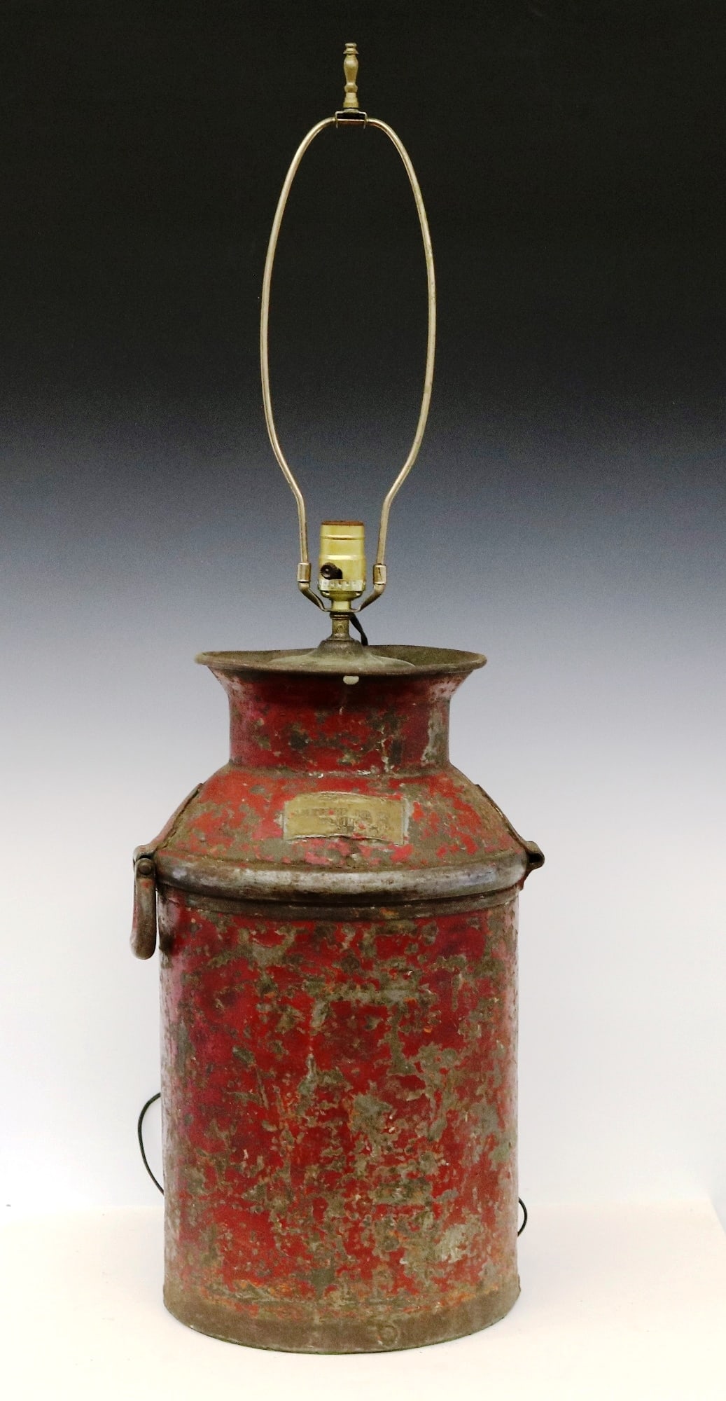 BALTIMORE OIL COMPANY METAL OIL JUG MOUNTED AS TABLE LAMP WITH SHADE HANDPAINTED WITH OIL RIGS. -: BALTIMORE OIL COMPANY METAL OIL JUG MOUNTED AS TABLE LAMP WITH SHADE HANDPAINTED WITH OIL RIGS. Jar bears brass label reading "Baltimore Oil Co./Baltimore, MD/50.2788", old red paint- - Jug, H: 19 in