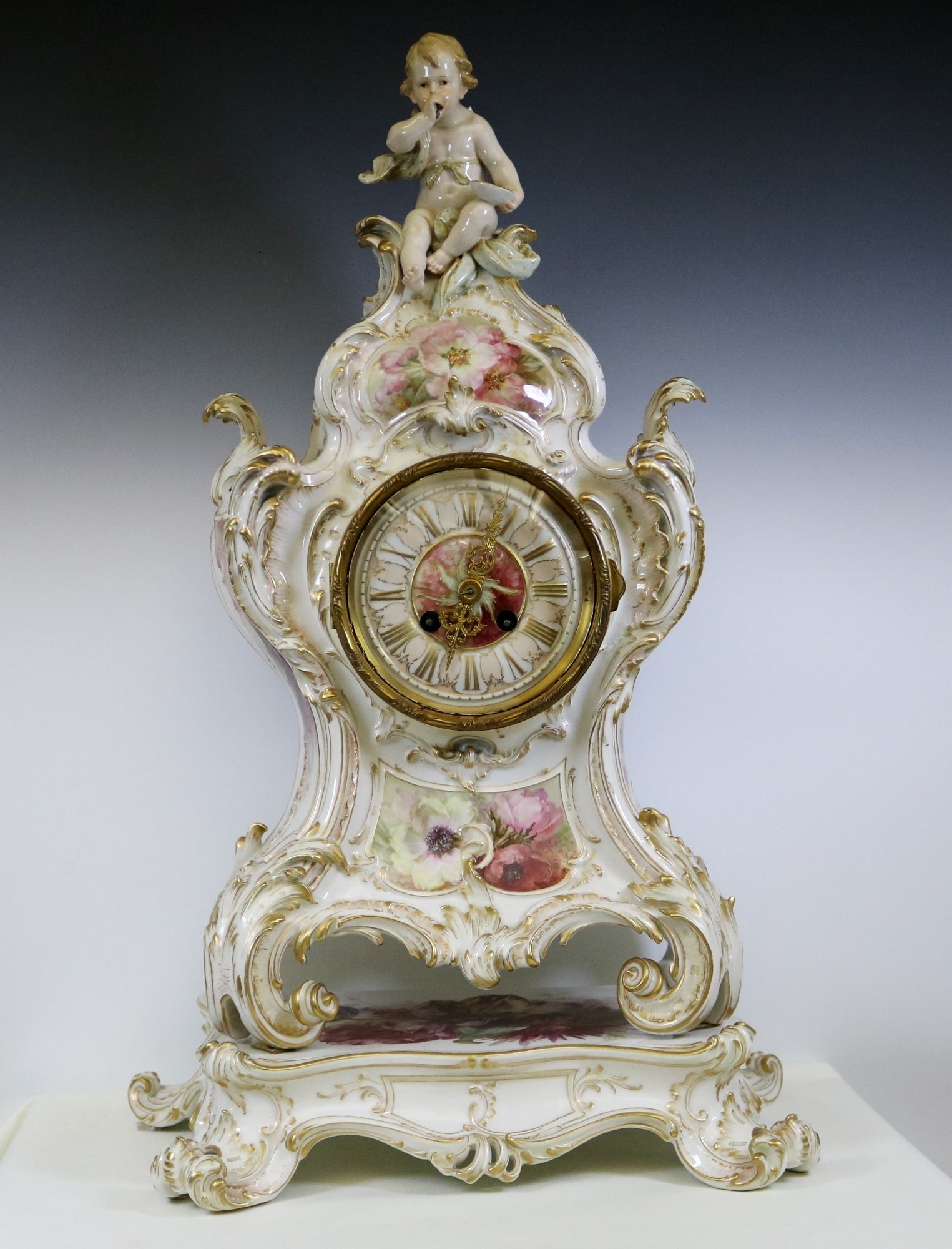 CONTINENTAL FLORAL DECORATED PORCELAIN CARTOUCHE SHAPE MANTEL CLOCK ON SEPARATE PORCELAIN STAND, (1 of 5)